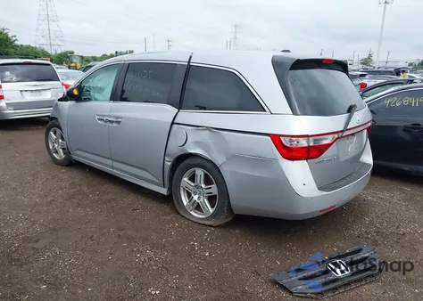 2012 Honda Odyssey Touring/Touring Elite z USA, uszkodzony, nr VIN 5FNRL5H94CB121361